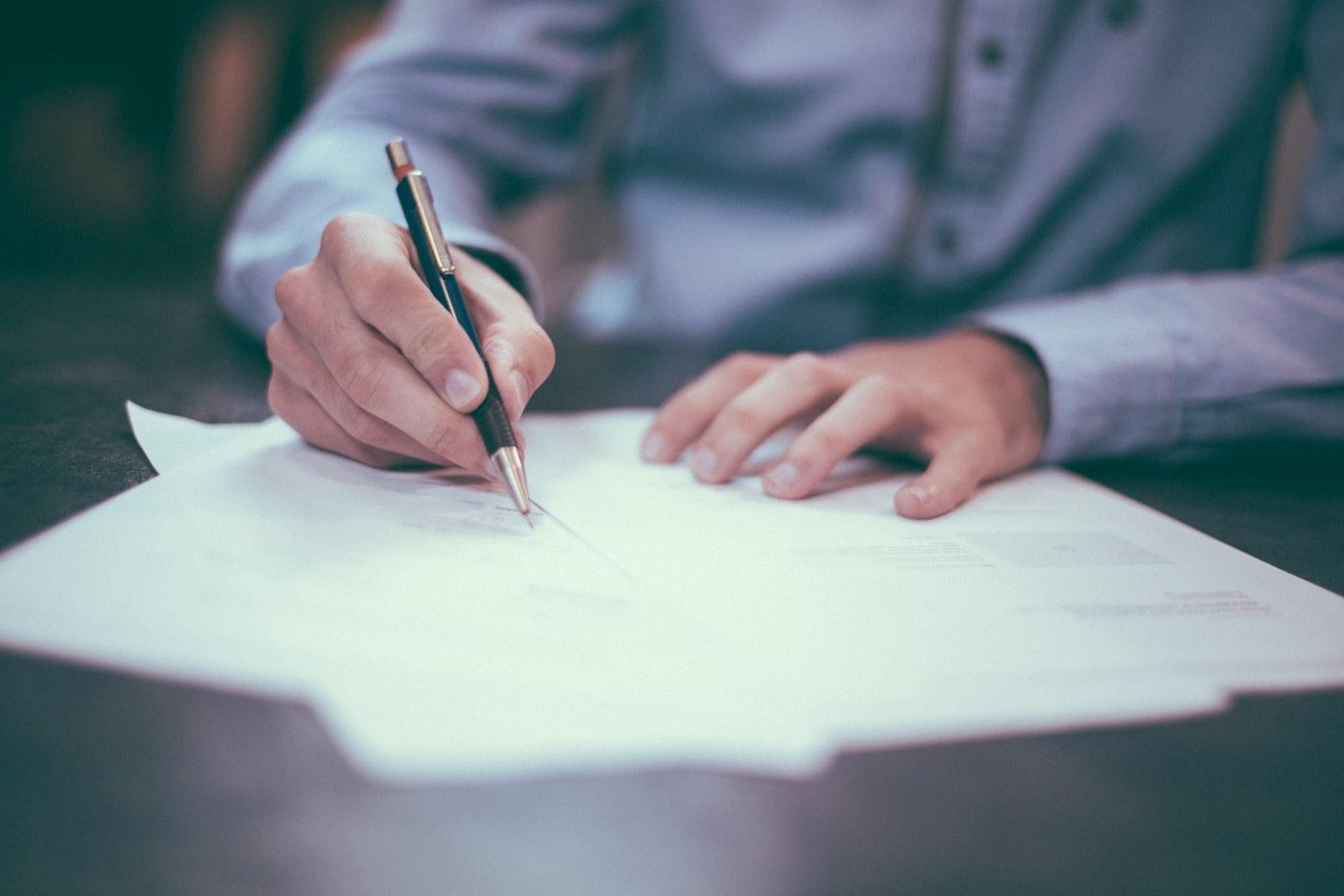 Business documents being reviewed at a desk
