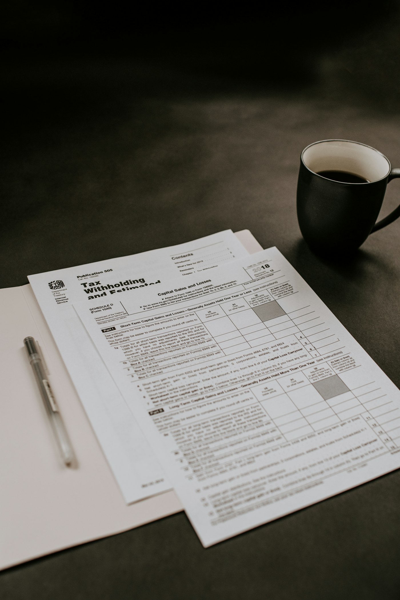 Financial planning documents and calculator on a desk
